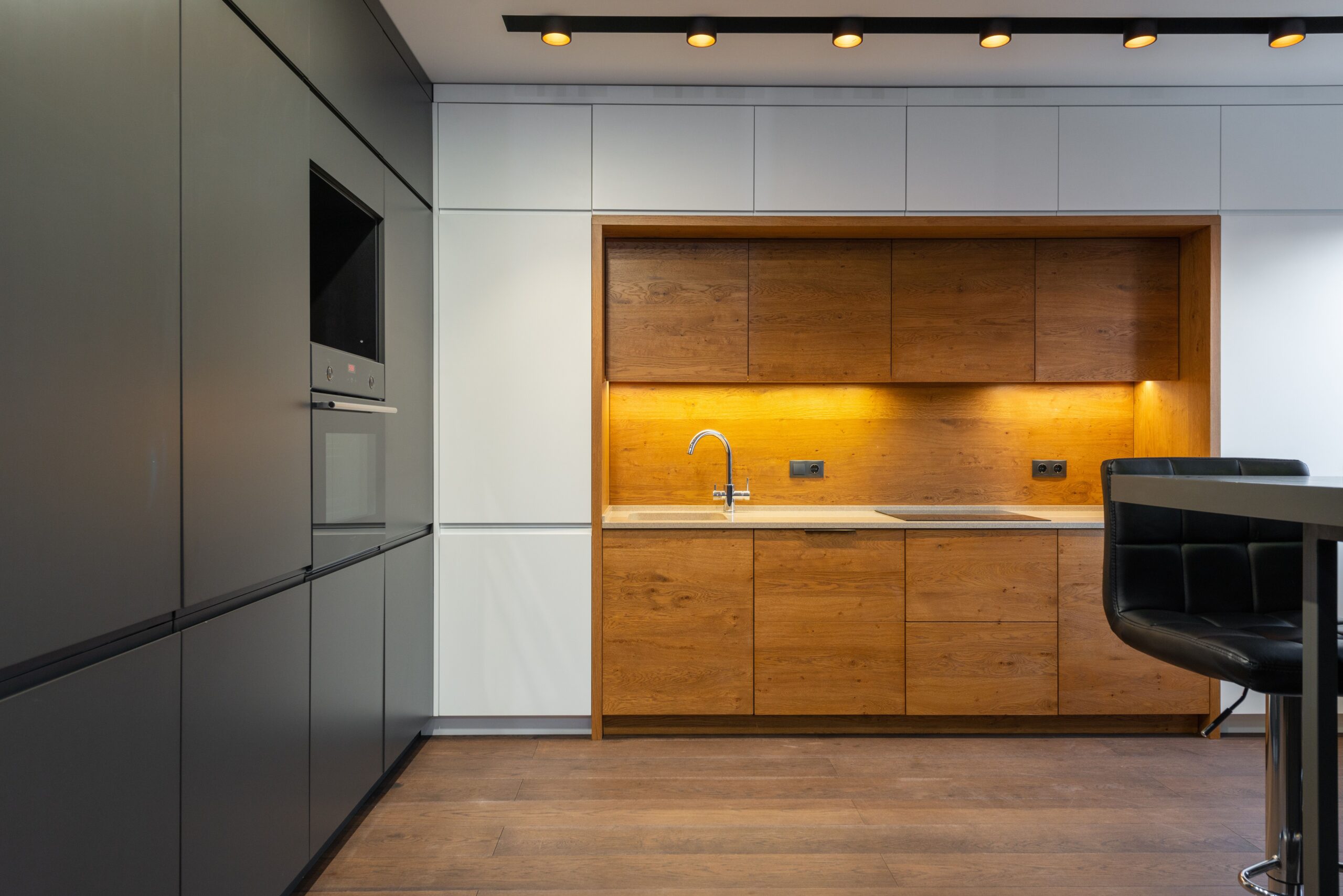 Maximize space in a small kitchen with tall wall storage that reclaims empty height