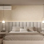 Small bedroom layout with a bed centered on the main wall, two nightstands, and a clear walkway to the window